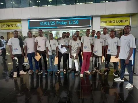 Group of placed candidates at airport departures lobby